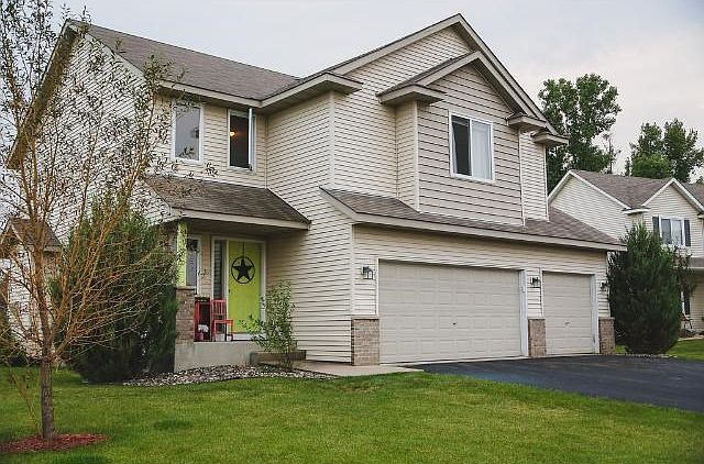 Front of the home has great curb appeal with front porch