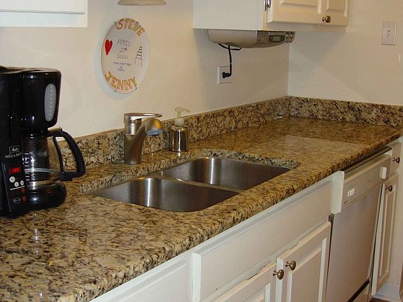 Granite countertops in kitchen and bathrooms.