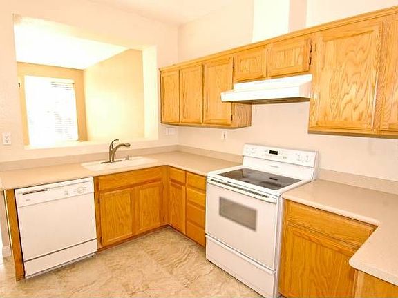 large kitchen with corian