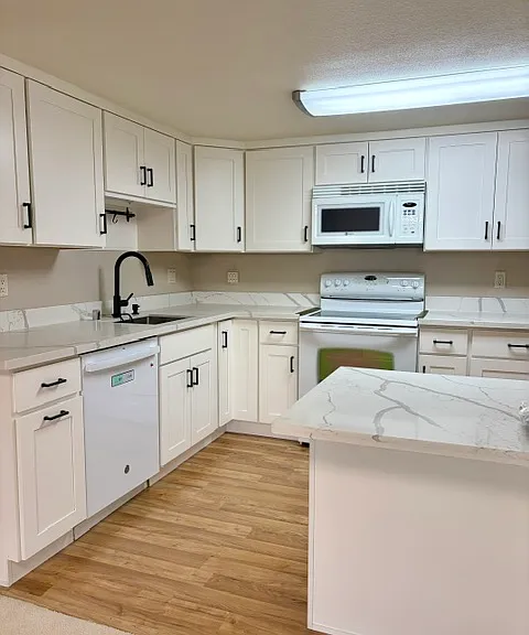 Remodeled kitchen with a pantry and brand new dishwasher