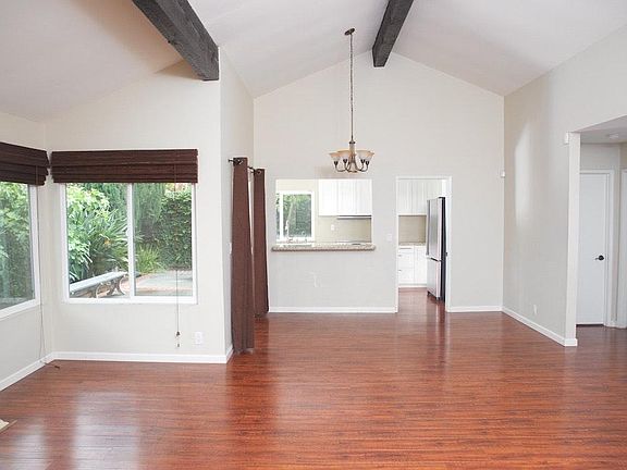 Family room with vaulted ceiling