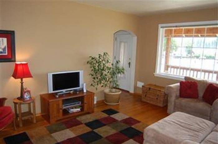 Comfortable living room is open to the dining room.
