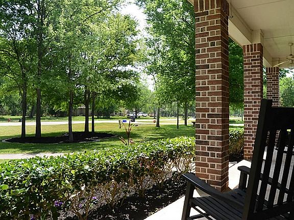  A large front Porch gives this home a traditional and appealing southern look. Beautiful mature trees populate the front yard and offer much needed shade in the Texas climate