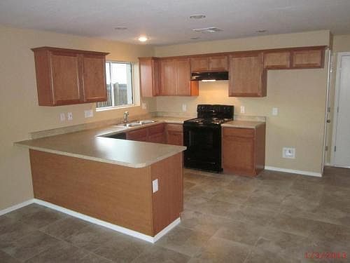 5th image of 6127 W Highland Ave