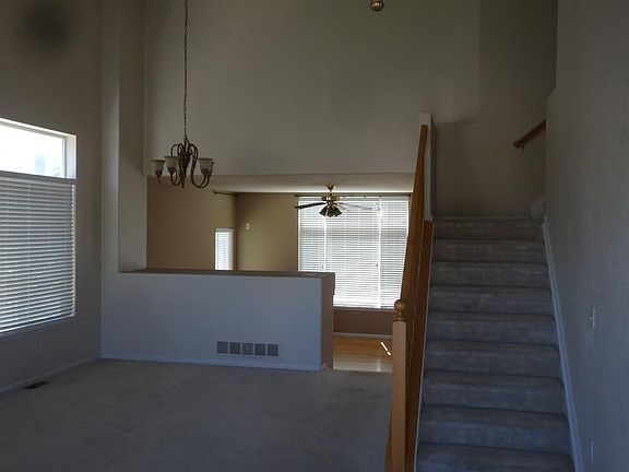 Front entry to living rm to den