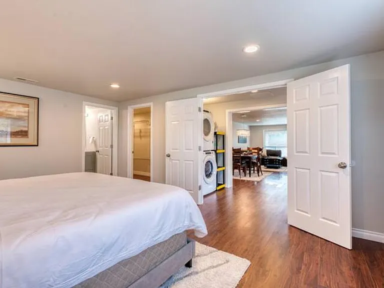 Double French Door for the primary bedroom. Doors leading to the private bath and walk in closet