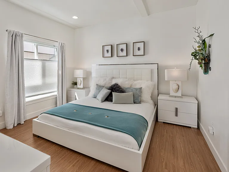 Master bedroom with bright light. 
The blackout curtains are included