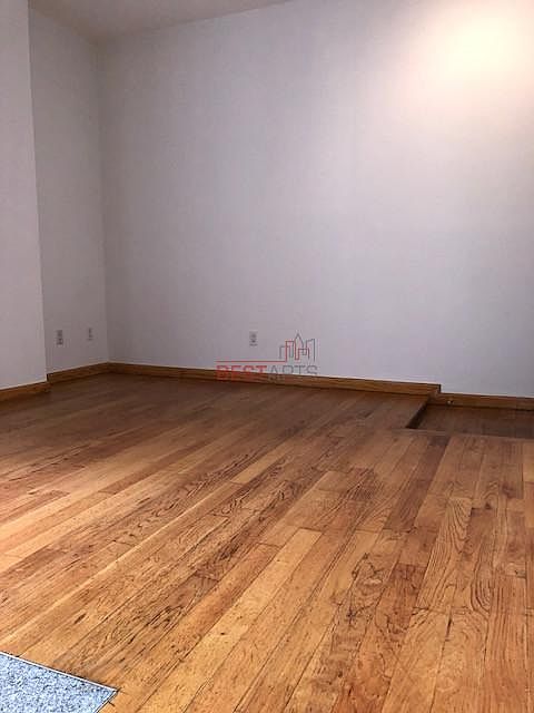 1st image of 120 E 1st St APT 7