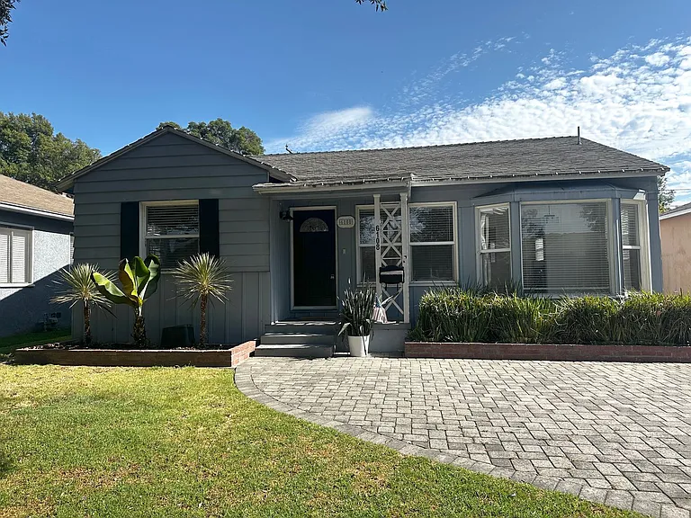 6108 Village Rd — Photo 1