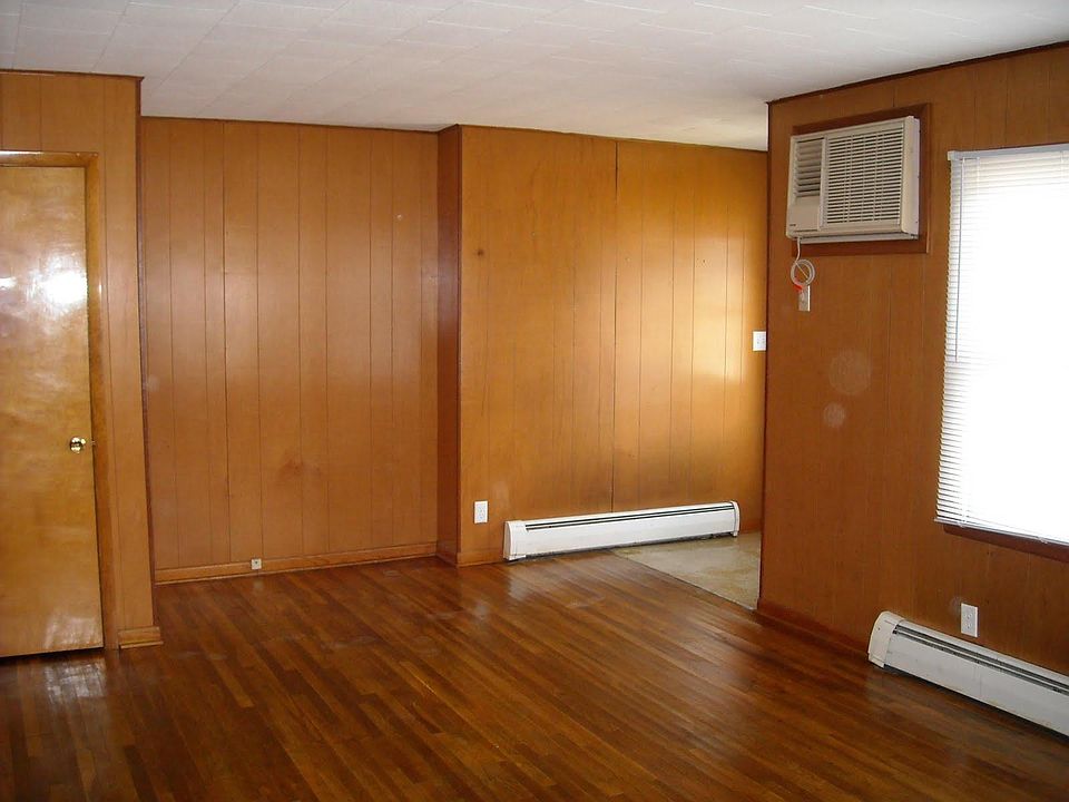 A/C unit installed in wall so windows can still be opened. Hardwood flooring in Living Room 20'10" x 12'