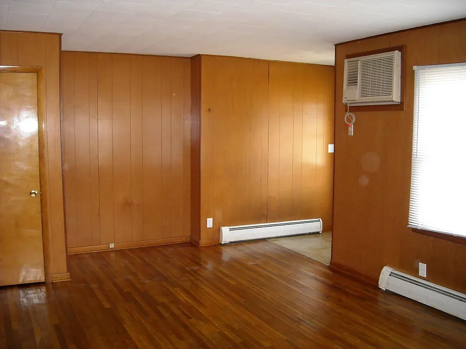 A/C unit installed in wall so windows can still be opened. Hardwood flooring in Living Room 20'10" x 12'