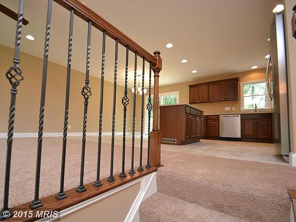 Entrance Foyer and View of Kitchen