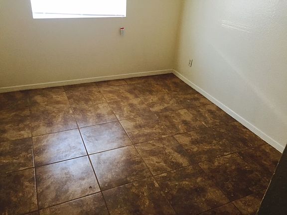 5th image of 8310 N 60th Ave APT 4