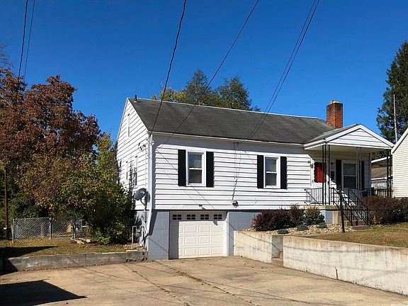 Large driveway can easily park several large vehicles.
