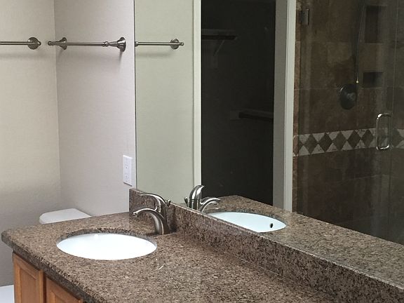 Master bath w/ double sinks.