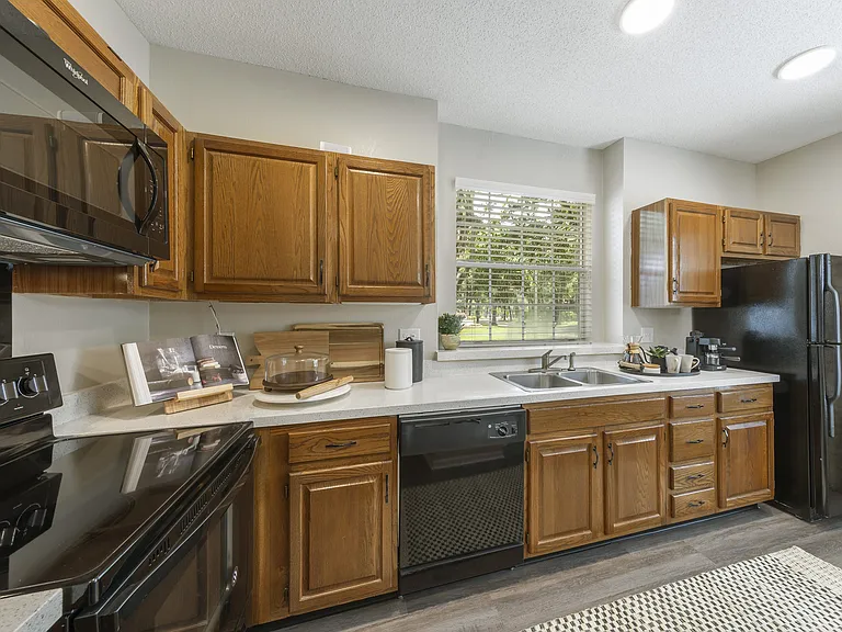 Spacious kitchen with solid-oak cabinetry and ample countertop space