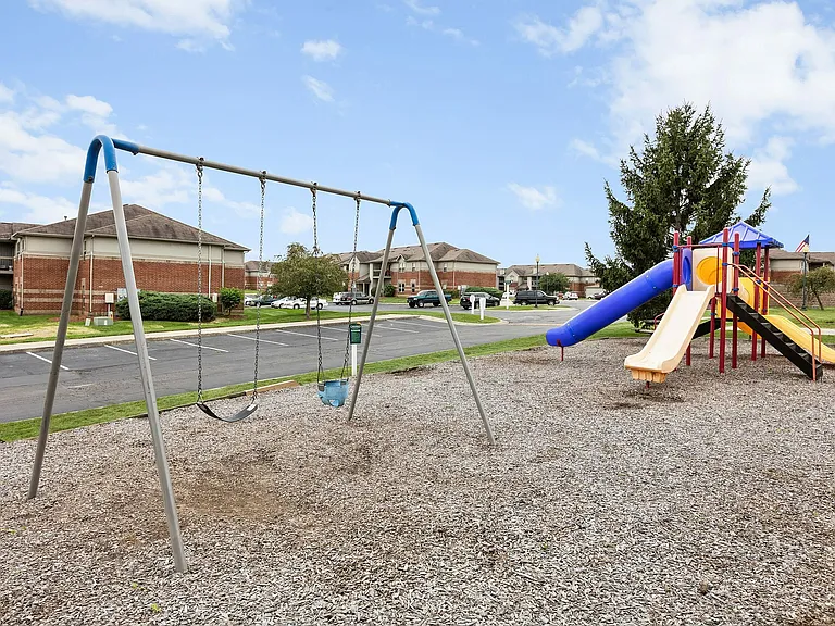 Slides, swings, and lots of room to play _ our playground makes it easy for little ones to burn off energy.