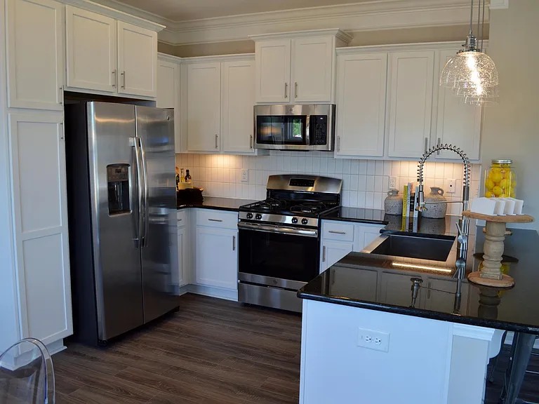 All stainless steel appliances and a gas stove give this kitchen high marks.