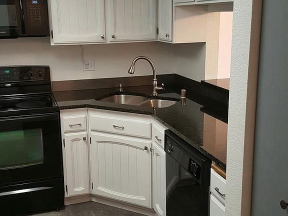 The is oodles of cabinet space plus a pantry. Room for ever