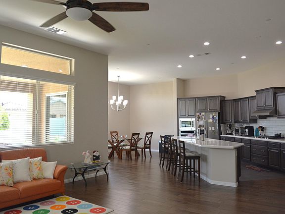 Kitchen and dining area viewed from family room - upgraded hardwood flooring