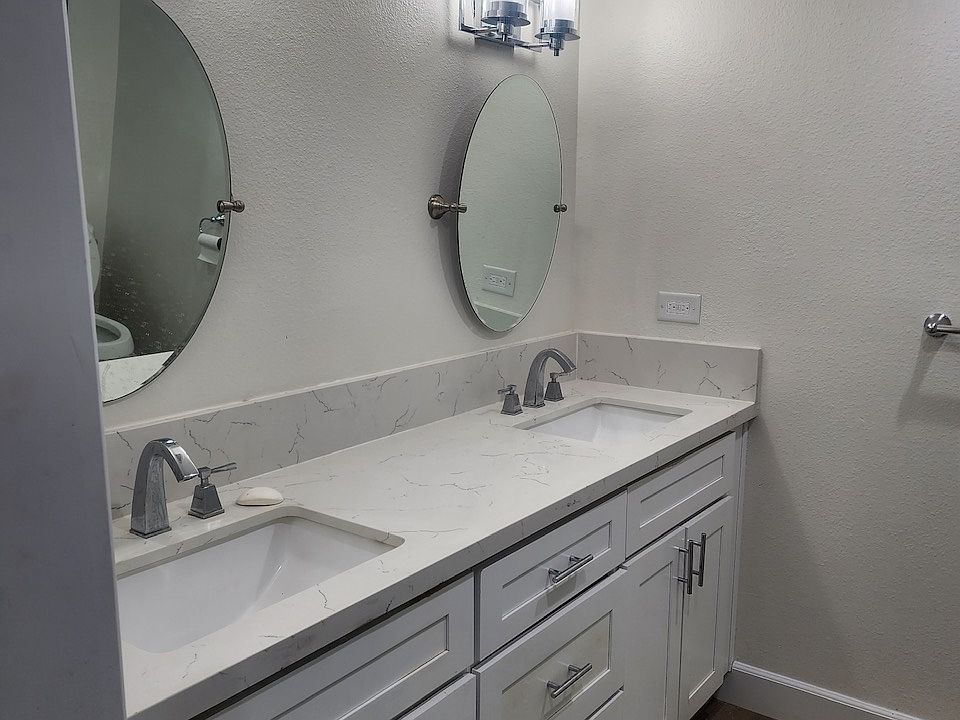 Primary Bathroom with double vanities and shower