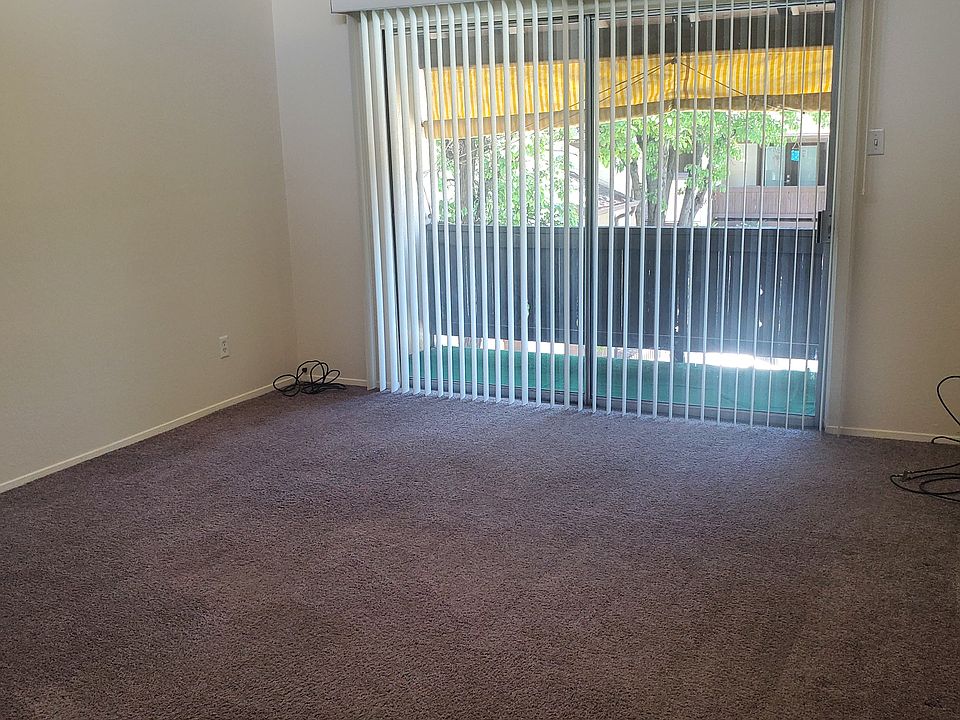 Living room, balcony overlooks a pool