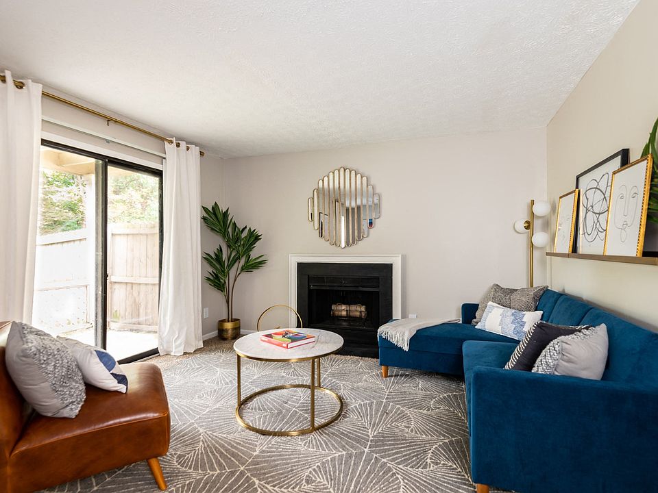 Living Room with Fireplace and Lots of Natural Light