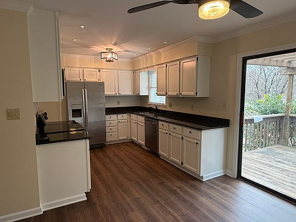 Updated kitchen with out door deck area for grilling.