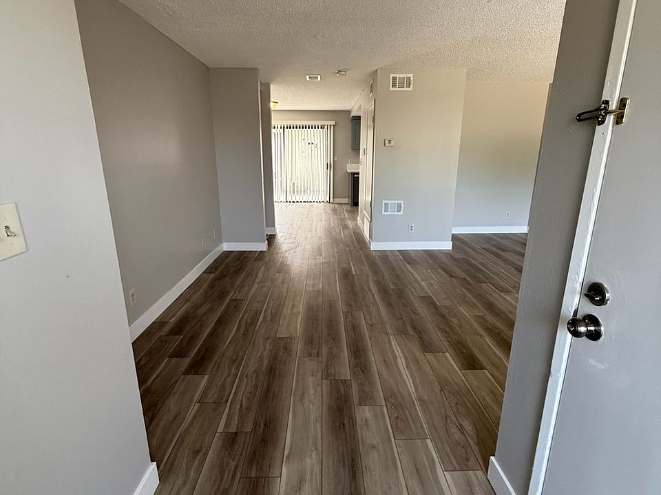 Main entrance. All new vinyl plank flooring throughout unit.
