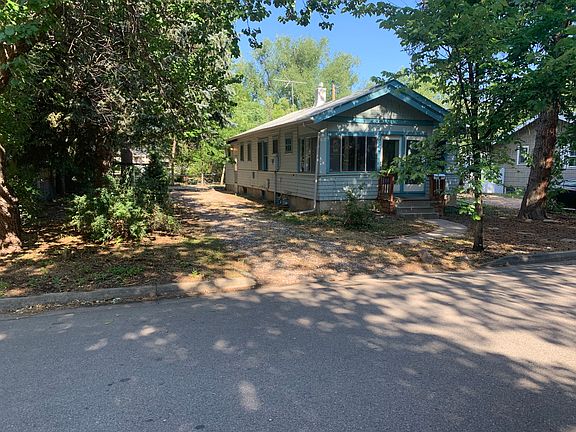 Driveway and house from street.