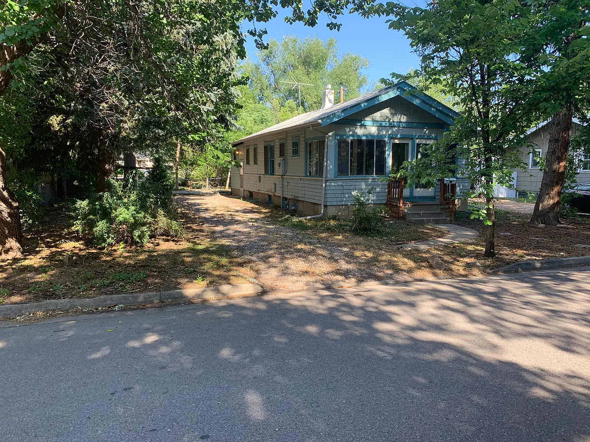 Driveway and house from street. - 523 S Bryan Ave