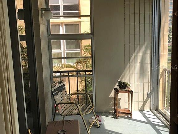 5th image of 7400 Sun Island Dr S APT 203