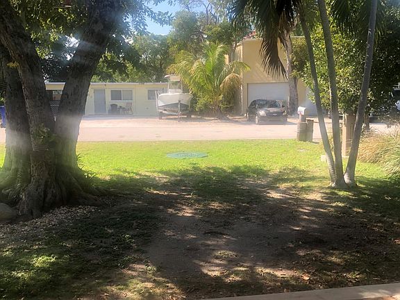 Nice shaded front porch and parking.