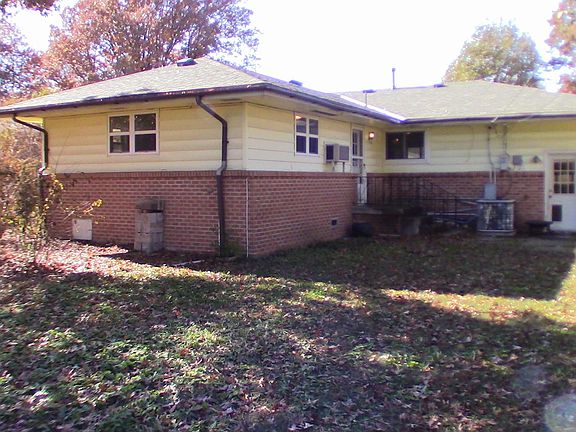 Backyard looking to house.
