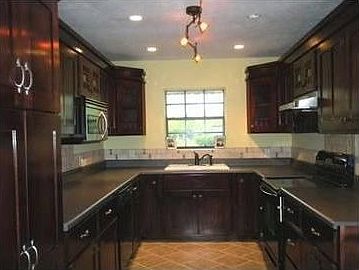 Cozy Livingroom
						:
						Family will feel right at home with the fireplace and floor to ceiling windows