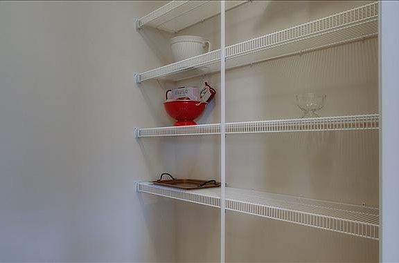 Large, under stairway pantry