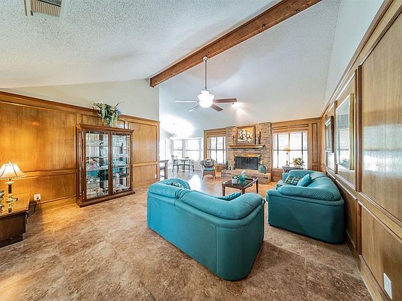 Charming formal living room with a wbfp