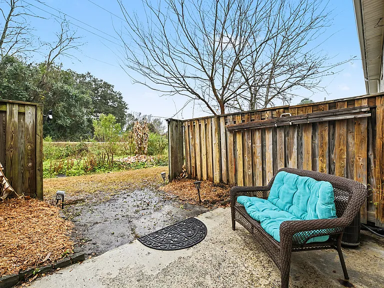 Back patio with seating for 2