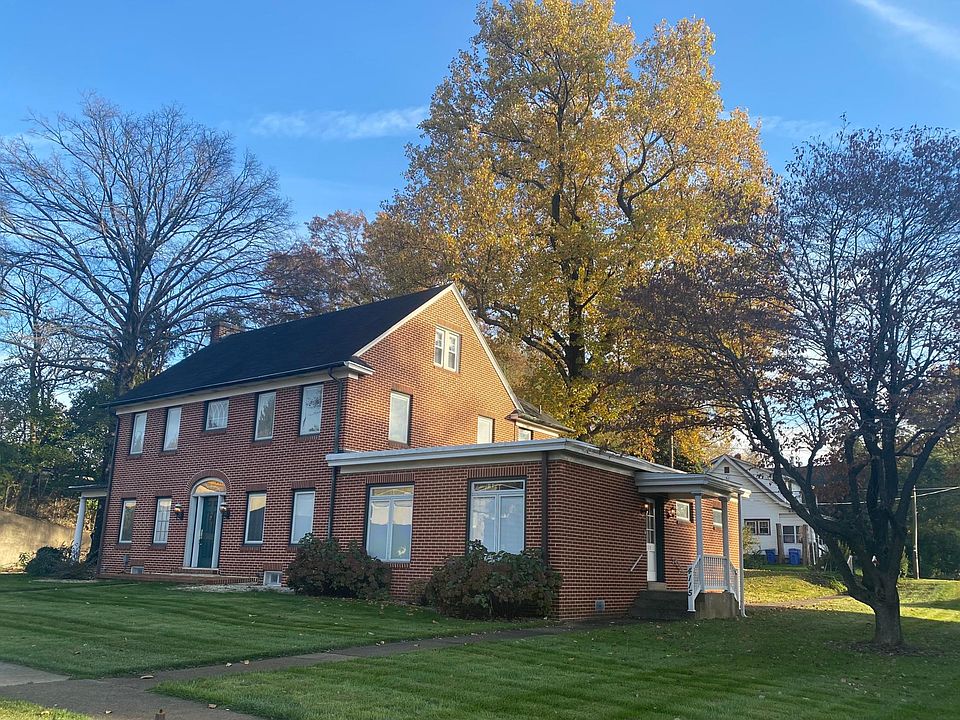 Front of Home. shows separate but attached office space not included in Lease .