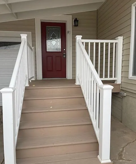 Stairway to the front door from the driveway and street