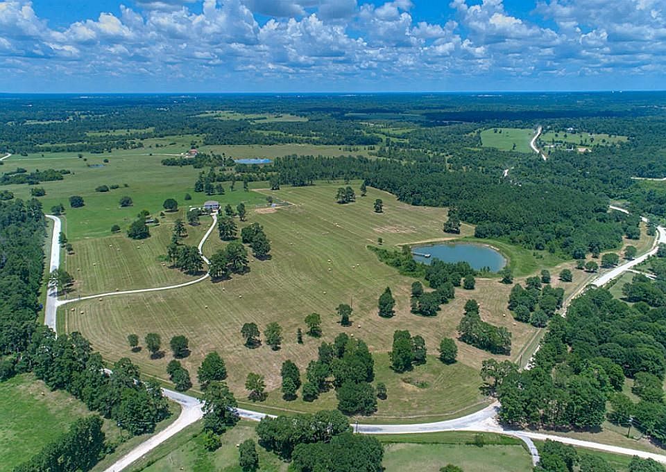 Country living at its finest! Rural location, but easily accessible to work and population centers in Conroe, The Woodlands, and North Houston area - 10 minutes to Huntsville, 35 minutes to Hwy 105 in Conroe, and 40 minutes to The Woodlands.