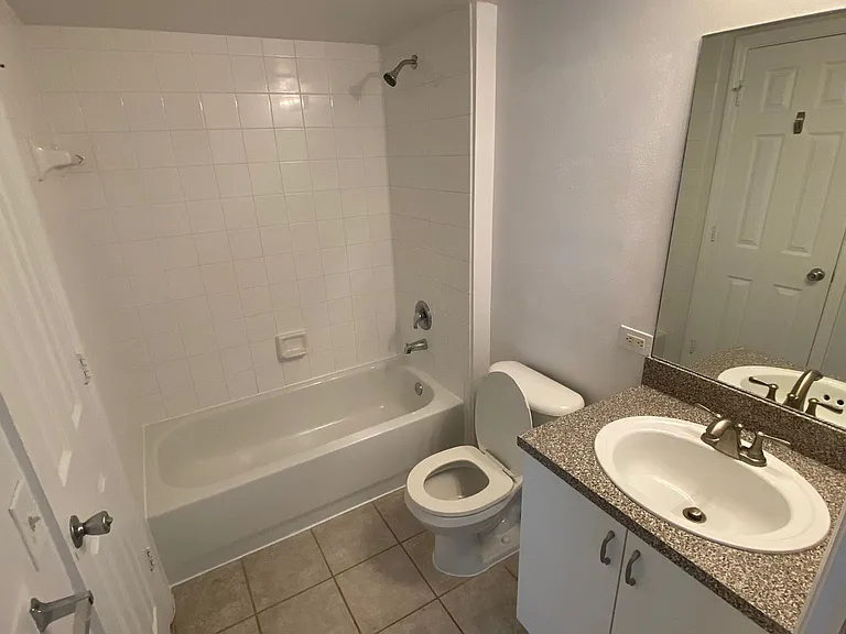 5025 Wiles Rd #303 — Photo 11