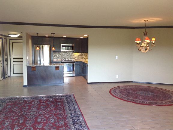 Another view of living room and kitchen