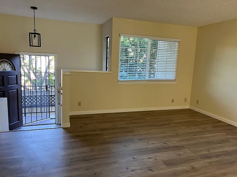 Living room with front door view