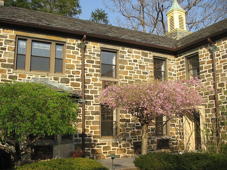 Exterior Entry from Meticulously Landscaped Courtyard