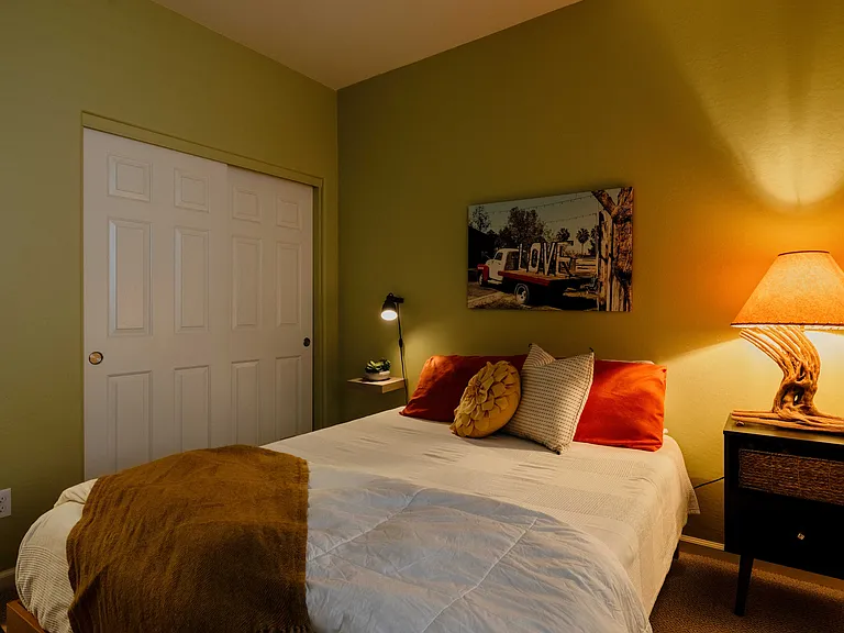 This is one of the bedrooms of the main living area and has a queen sized bed.