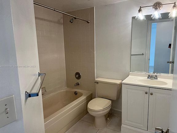 5th image of 8741 Wiles Rd APT 103