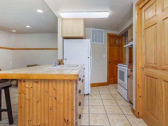 View from front door to kitchen and laundry room.