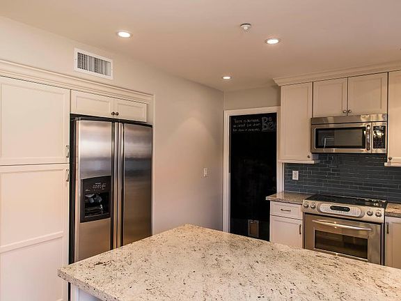 Kitchen with garage entrance