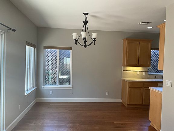 Dining area adjacent to kitchen and living areas